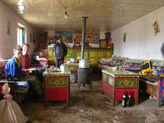 Peter Ryan and Charlotte Ryan enjoy a soft drink in Sangsha on the way from Kailash to Tholing in the Tibet Guge Kingdom